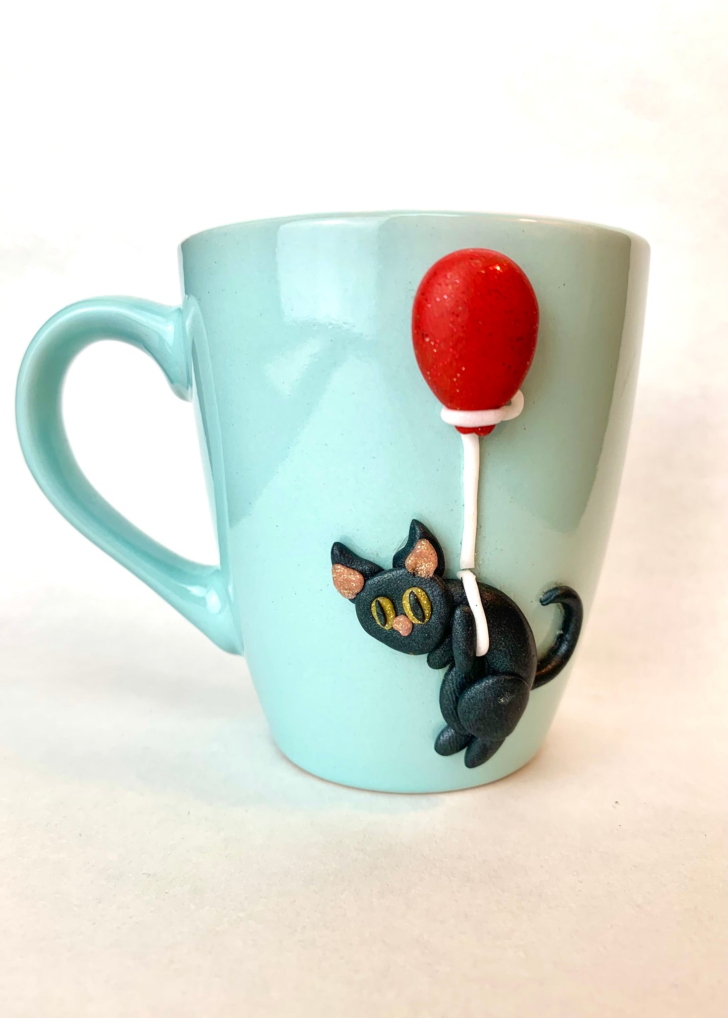 Mug chat noir au ballon