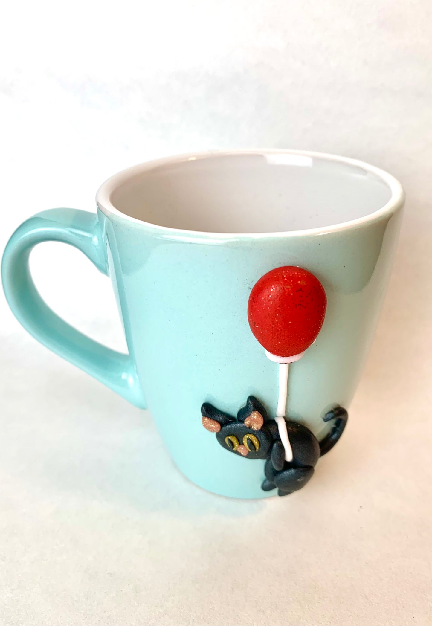 Mug chat noir au ballon