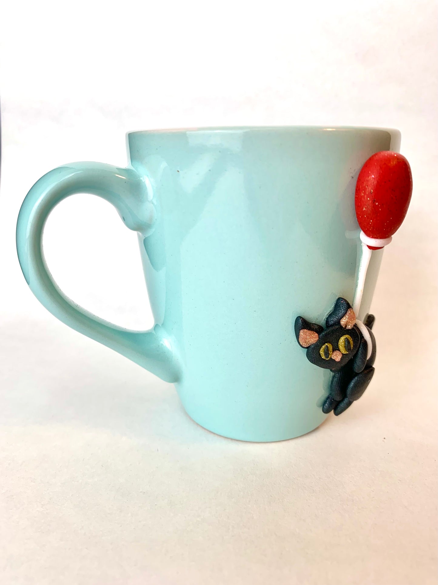 Mug chat noir au ballon