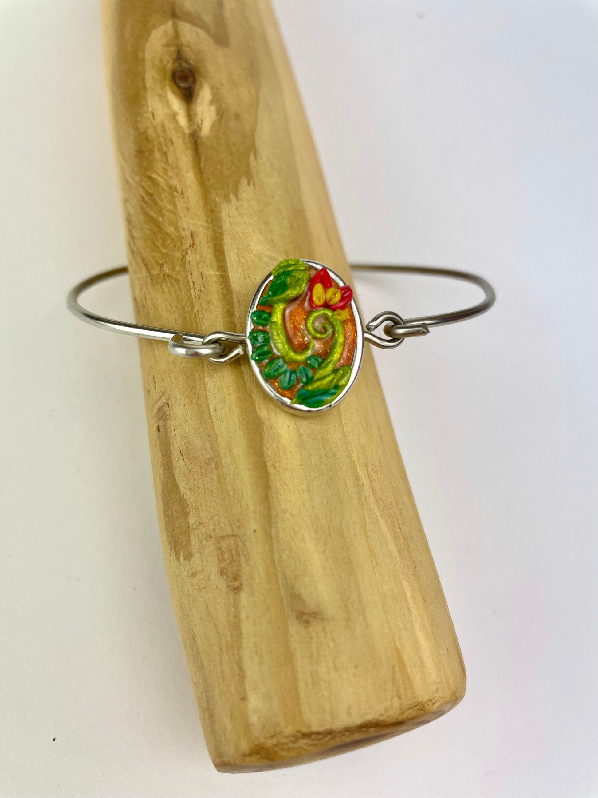 Bracelet artisanal Fleur de Paradis – cabochon en pâte polymère